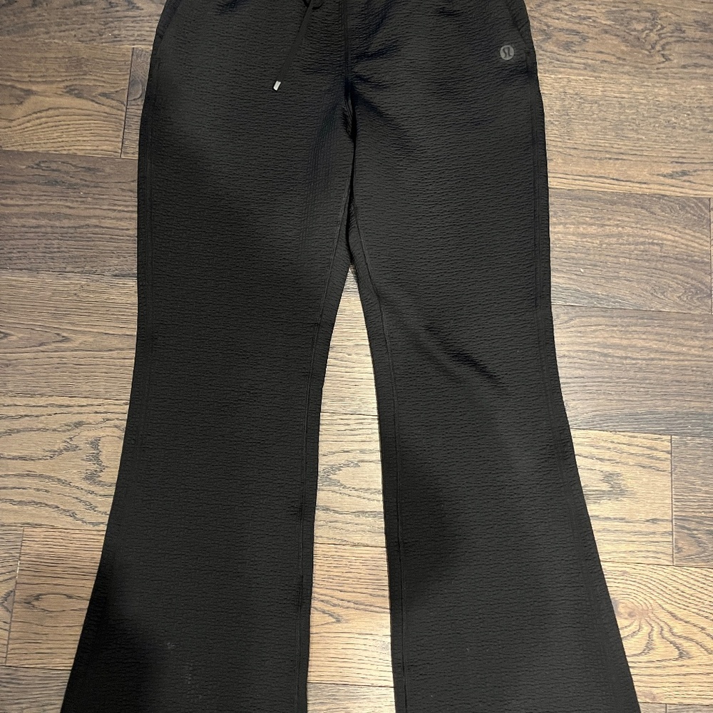 Lululemon textured high rise flared track pants 32”